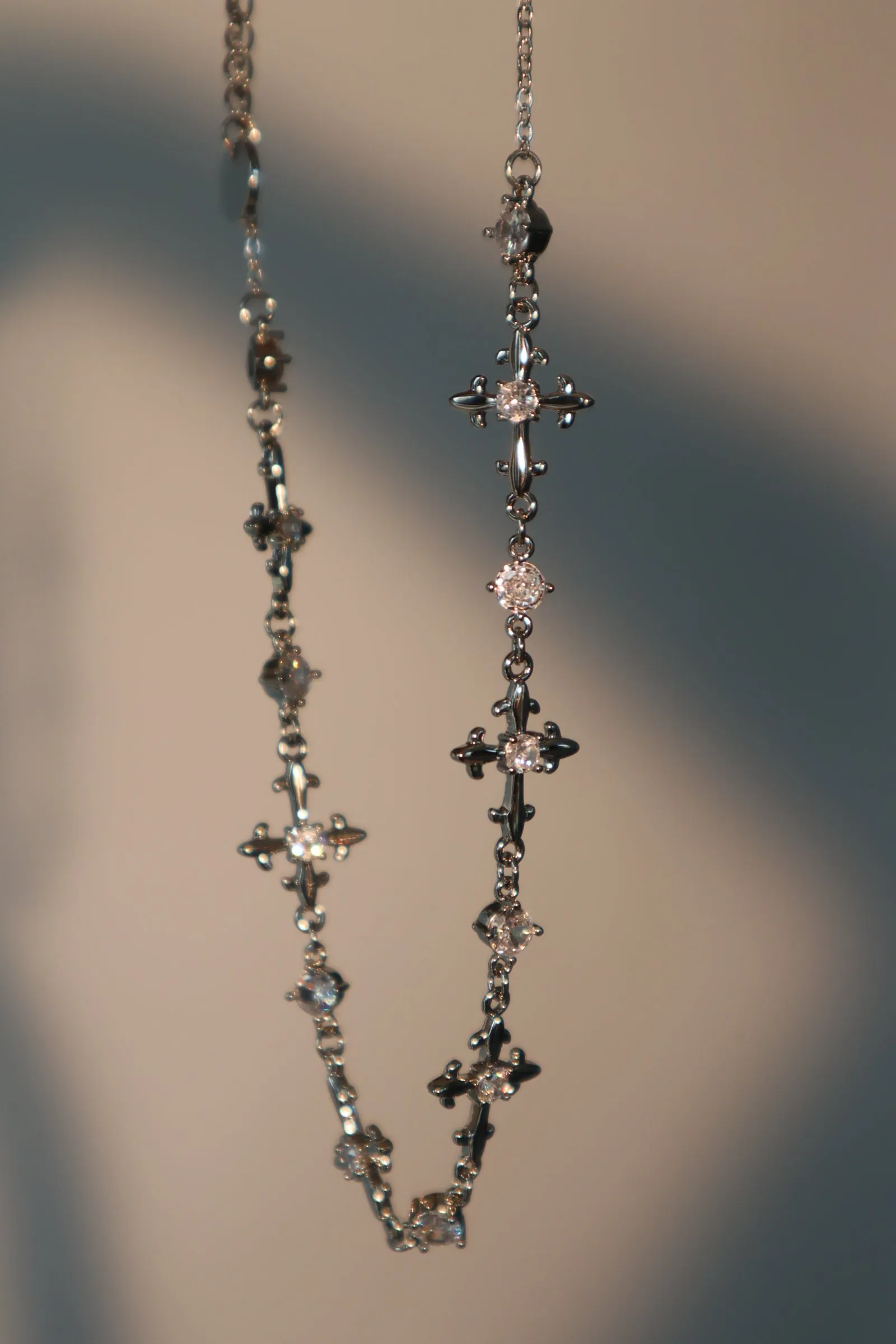 Platinum Plated Multi Diamond Cross Necklace