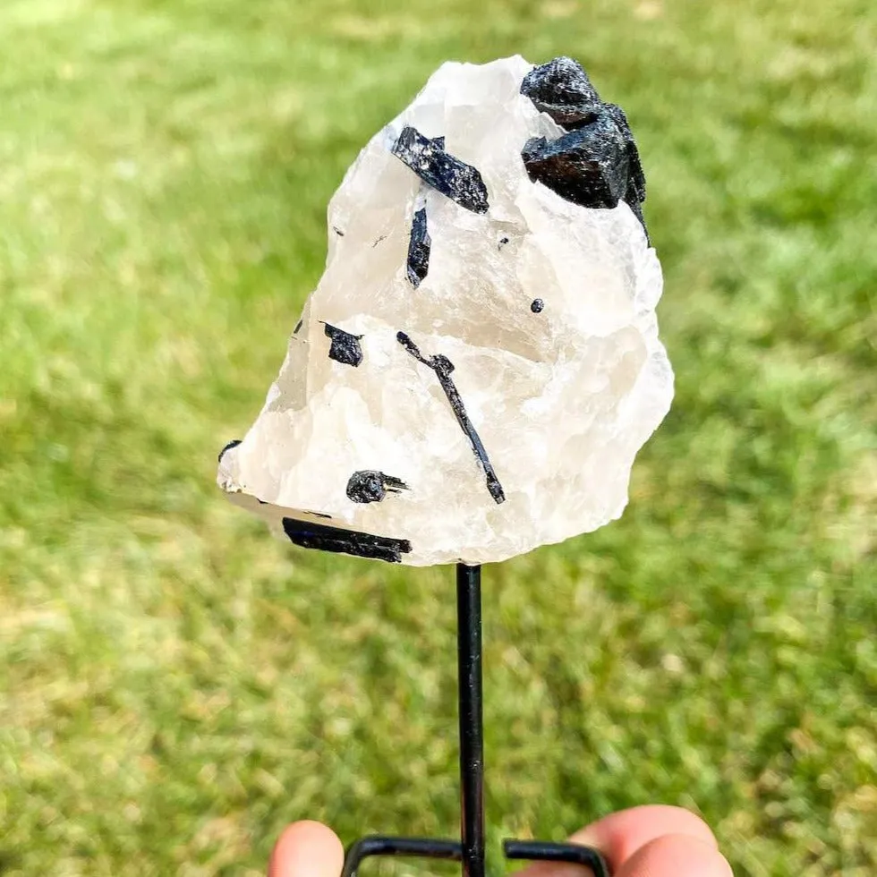 Tourmalated Quartz on a stand